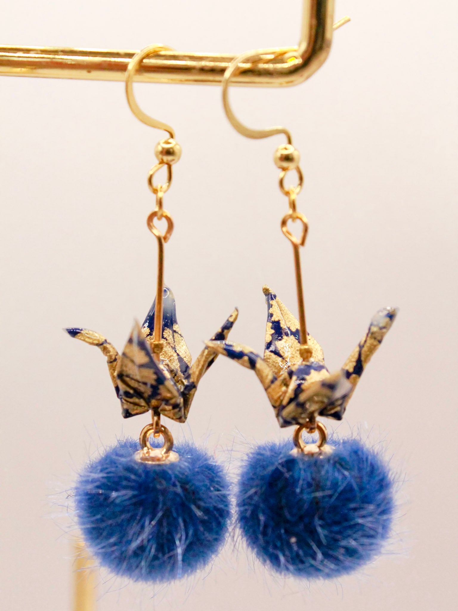 origami-crane-earrings-with-pom-pom-navy-gold