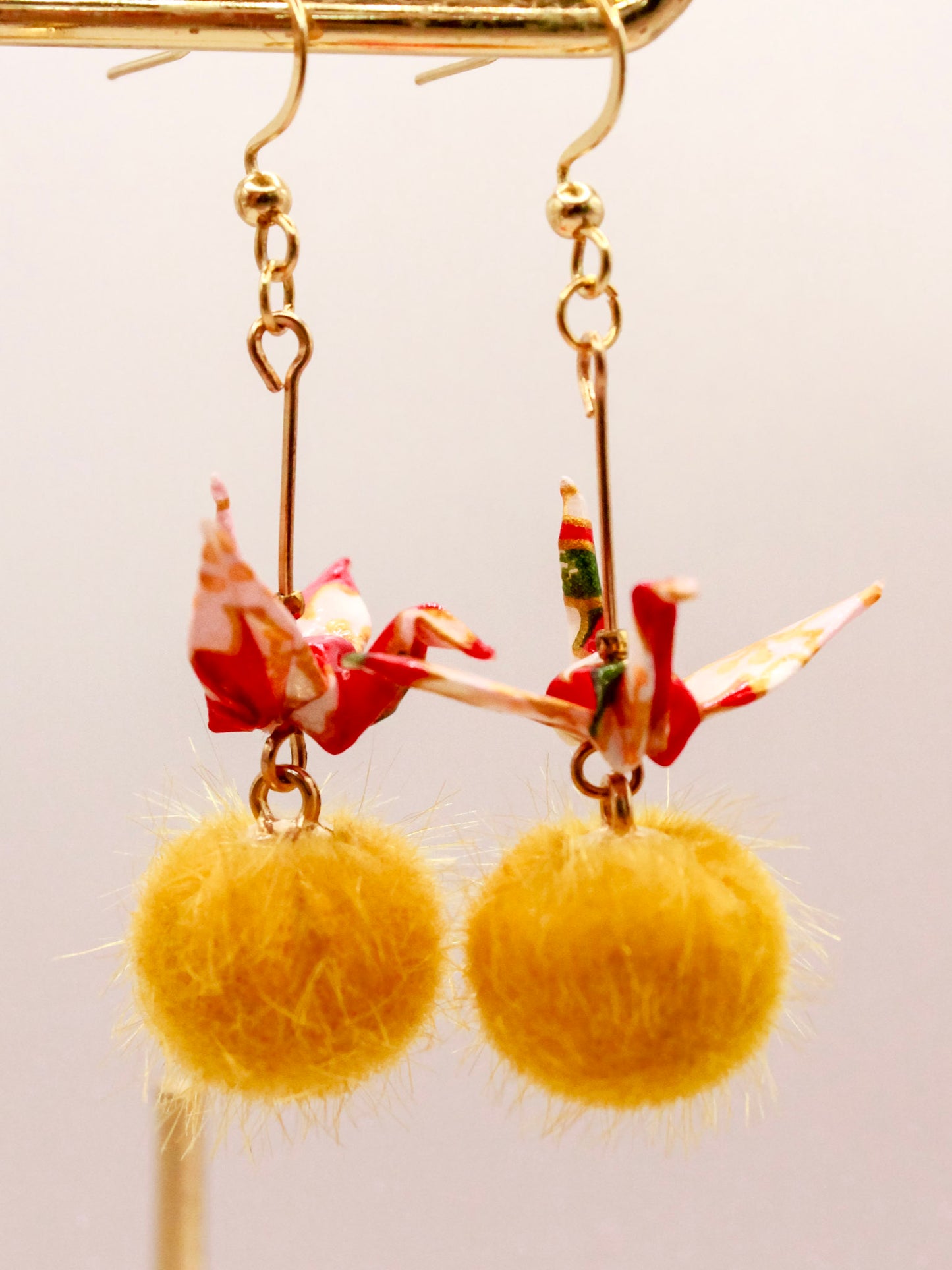 origami-crane-earrings-with-pom-pom-red-yellow