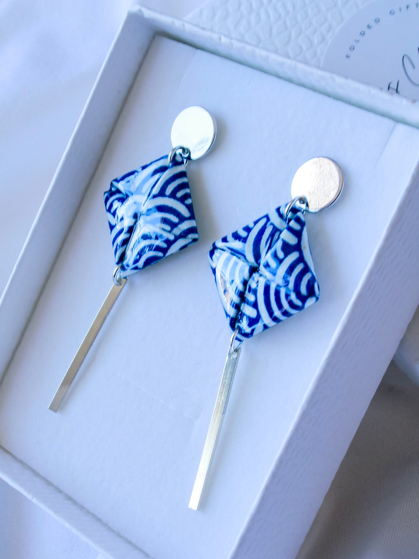 Handmade blue wave origami dangle earrings – hypoallergenic silver-plated stainless steel, ocean-inspired jewellery for her.